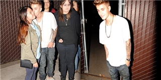 Justin Bieber mạnh mẽ vượt rào để chụp ảnh cùng fan