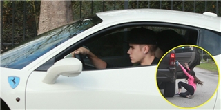 Mải mê đuổi theo Justin Bieber, fan ngã nhào khỏi xe hơi