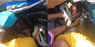 Kinh hoàng em bé 2 tháng tuổi bị cuốn vào bánh xe gắn máy