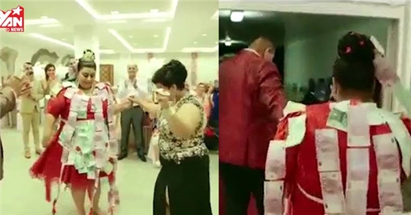 Cô dâu "chịu chơi": Mặc váy cưới hơn 5 tỷ, bốc vàng ném cho quan khách