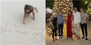 Harper Beckham viết lời yêu thương gửi bố mẹ trên cát